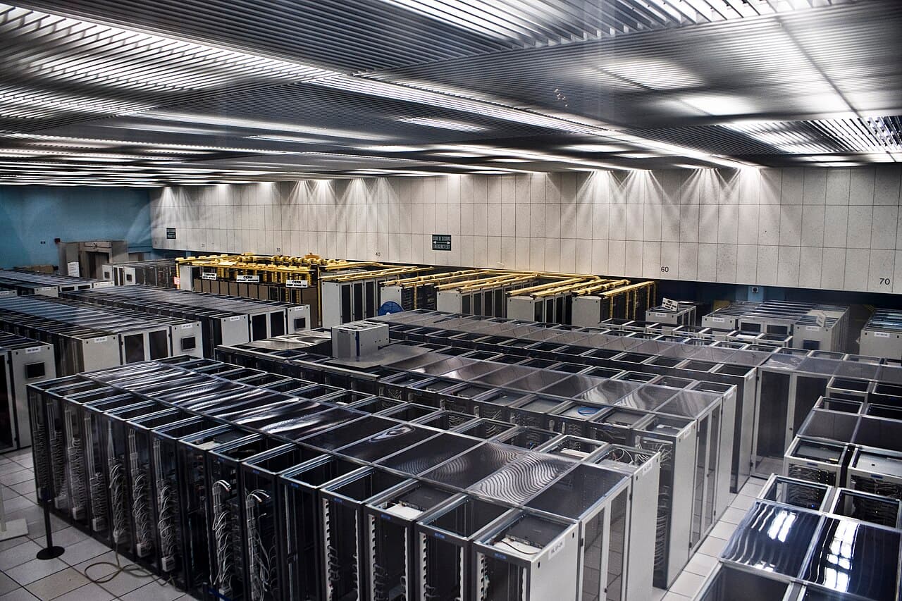 Server racks in a data center, representing the decoupled infrastructure that headless commerce relies on.